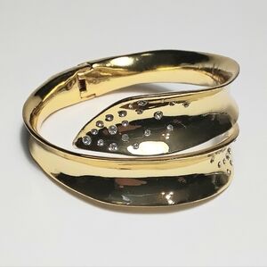 RLM Studios Goldtone Hinged Cuff Bracelet cz accents